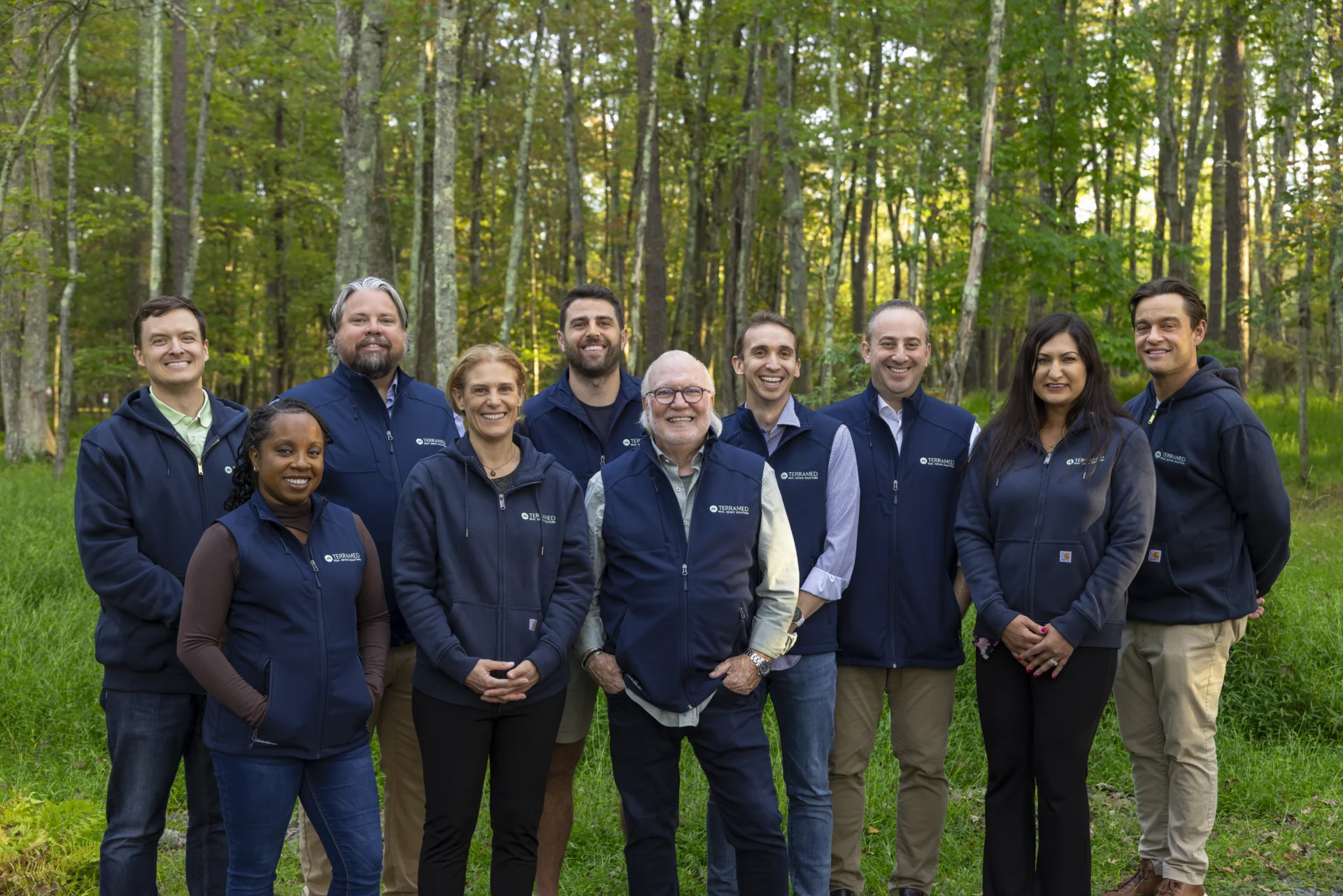 Group photo of Terramed Team outside in nature. 